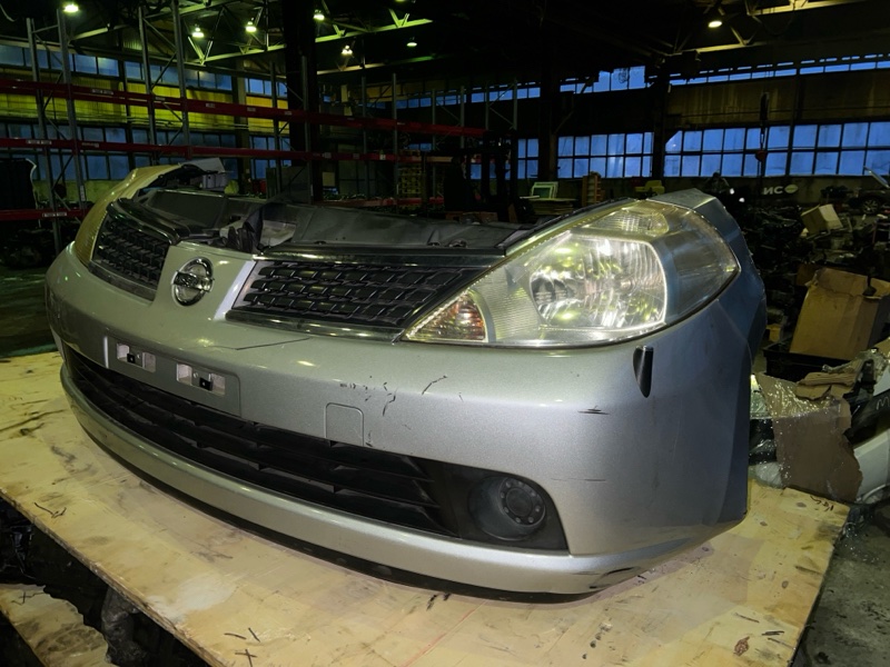 фотография nissan-tiida-nose-cut-1 2